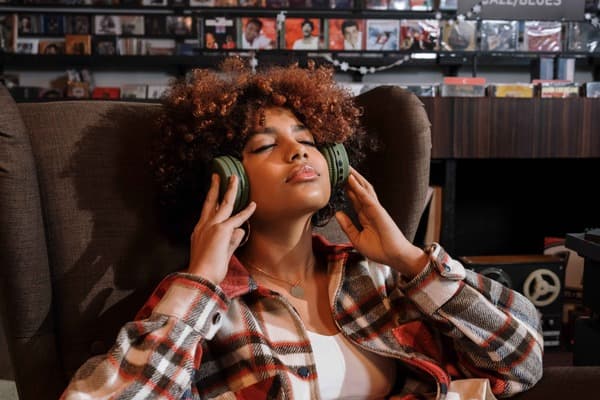 Girl peacefully listening to white noise